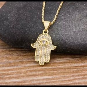 Gold plated hamsa necklace
